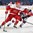 BUFFALO, NEW YORK - DECEMBER 26: Denmark's Lucas Andersen #17 maintains puck possession against USA's Quinn Hughes #6 during the preliminary round of the 2018 IIHF World Junior Championship. (Photo by Andrea Cardin/HHOF-IIHF Images)


